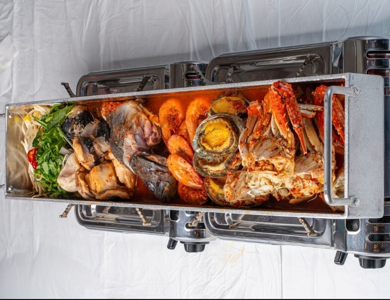 생생정보 결정적한수 70cm 해물조림을 불판에 올린 모습